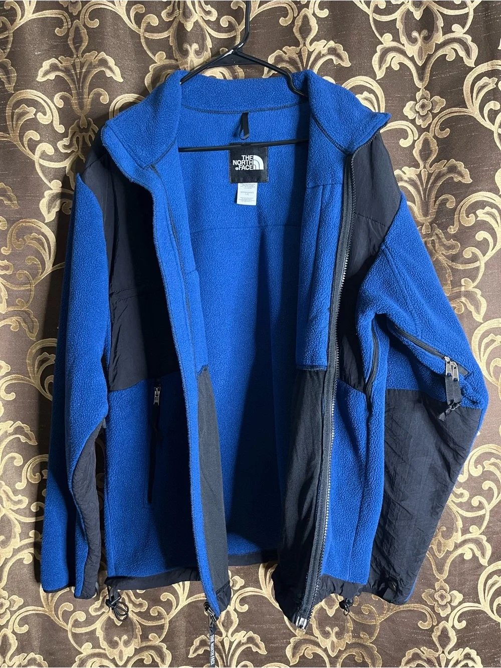The North Face Men’s Black Denali Jacket with Blue Fleece Lining